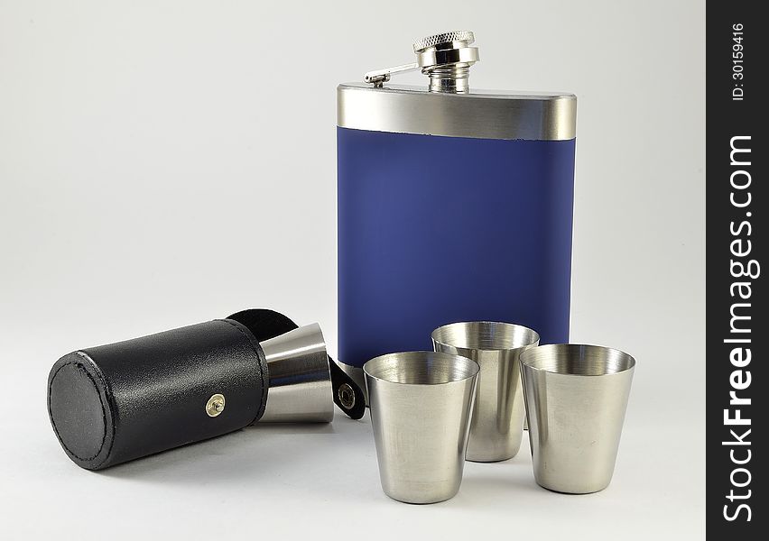 Flask marching with metal cups. Flask marching with metal cups