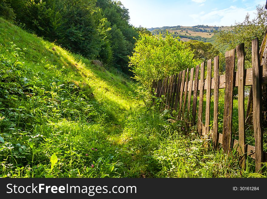 Wooden Fence In Mountains