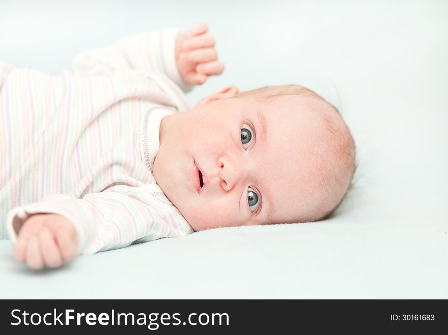 Cute newborn adorable baby at home . This image has attached release.