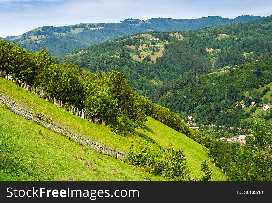 Wooden Fence In Mountains