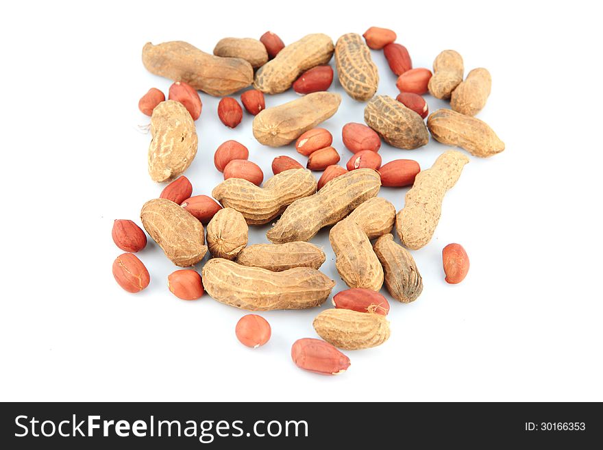 A lot of Peanuts on isolated over white background. A lot of Peanuts on isolated over white background.