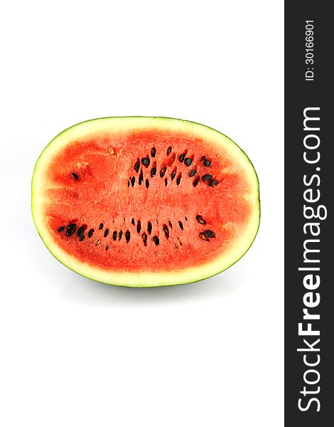 Watermelon which are sliced into pieces and have a seed. Watermelon which are sliced into pieces and have a seed.