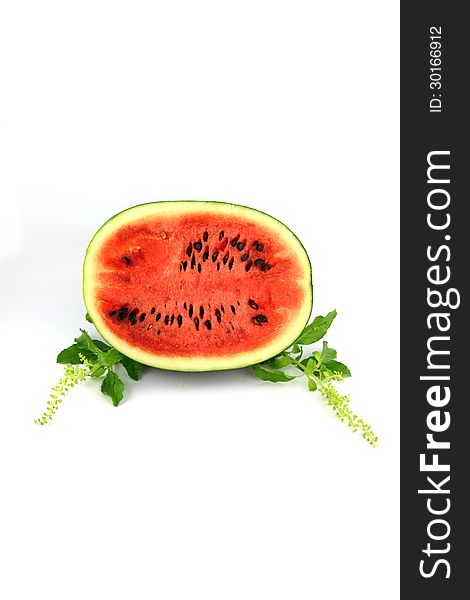 Watermelon which are sliced into pieces and have a seed. Watermelon which are sliced into pieces and have a seed.