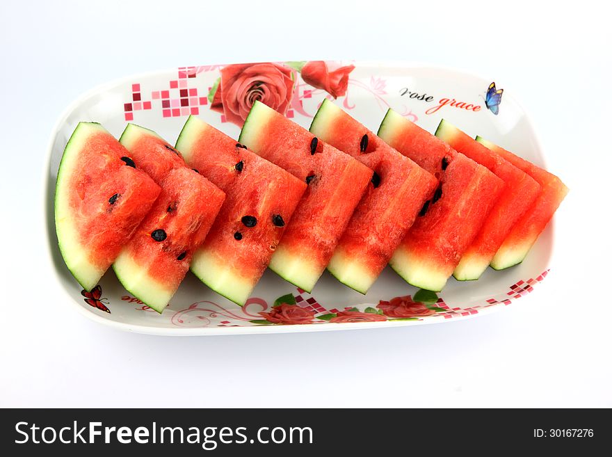 Watermelon Which Are Sliced Into On Dish.