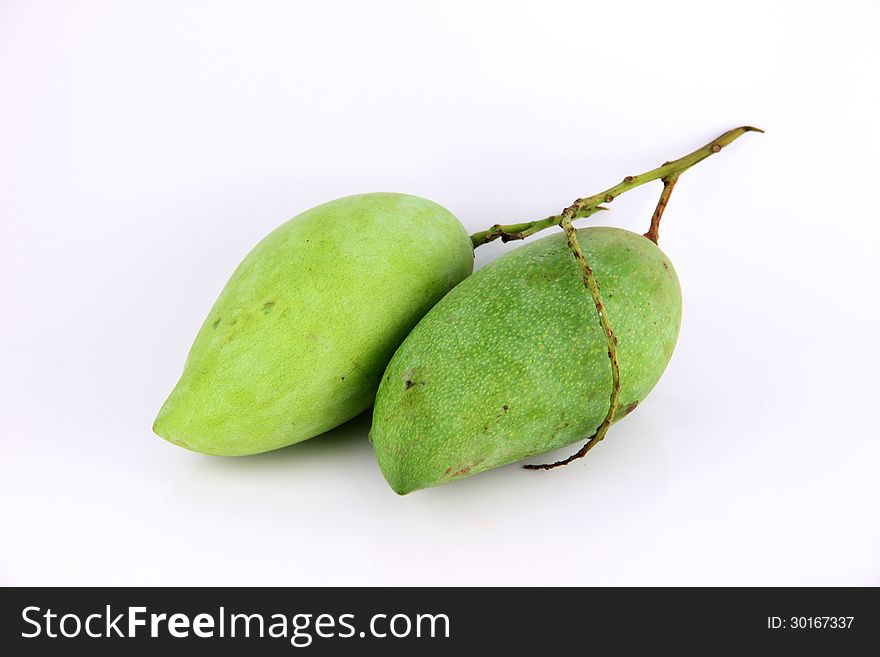 The Ripe mangoes are in the yellow color,on white Background. The Ripe mangoes are in the yellow color,on white Background.