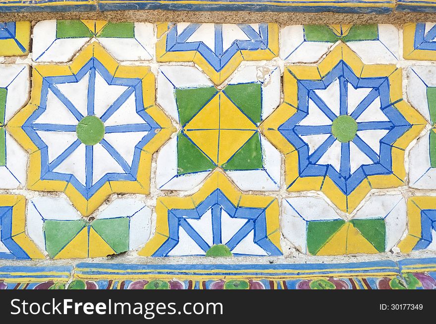 Colorful vintage ceramic tiles wall decoration background.