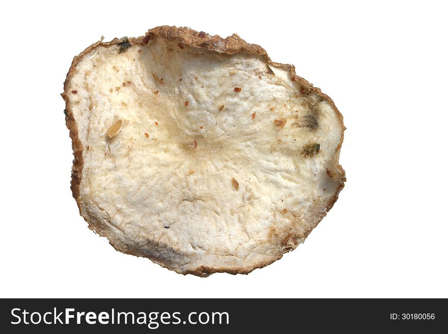Macro closeup of single sliced naturally seasoned dried potato chip isolated on white. Macro closeup of single sliced naturally seasoned dried potato chip isolated on white