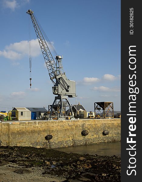 Dockyard crane on a jetty. Guernsey