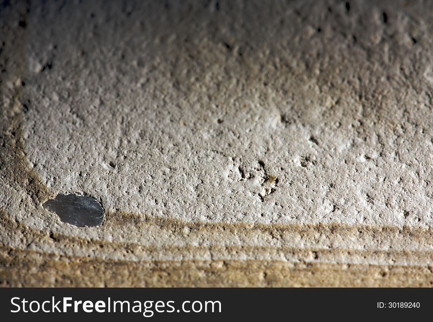 Closeup image of the surface of a smooth stone. Closeup image of the surface of a smooth stone.