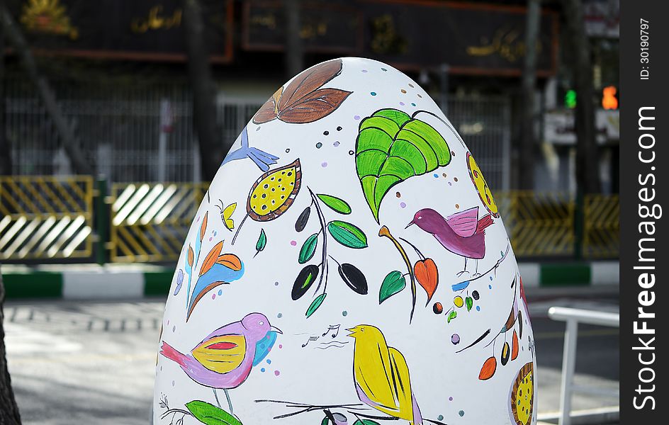 Big painted plaster egg at street, one of the symbols of Persian new year’s arrival