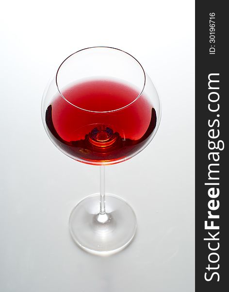 Wineglass filled with wine. Studio shot. Wineglass filled with wine. Studio shot