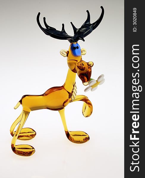 Scene of the statuette moose on white background