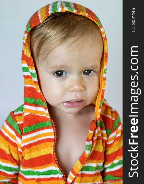 Image of cute toddler wearing a hooded jacket