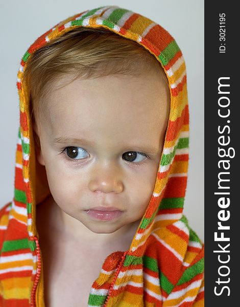 Image of cute toddler wearing a hooded jacket