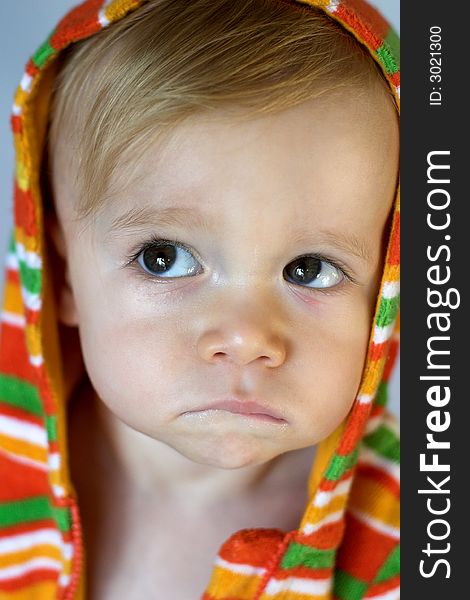 Image of cute toddler wearing a hooded jacket