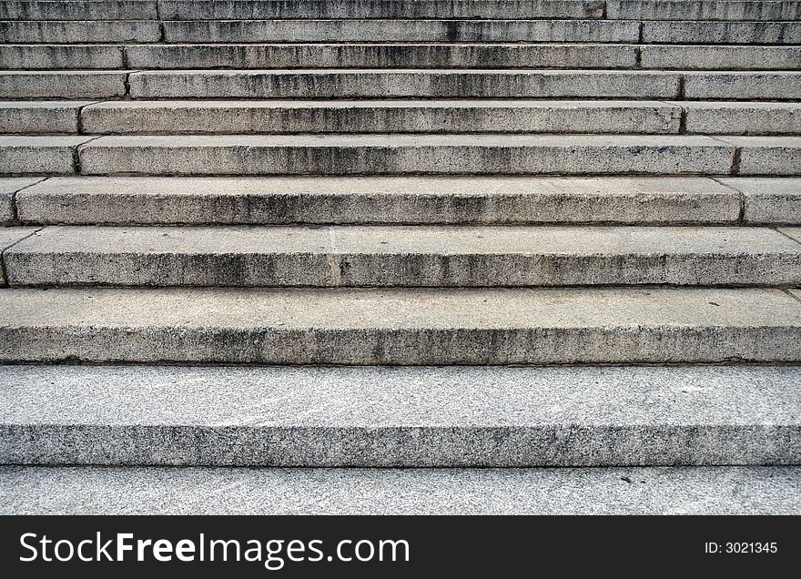 Large old stone steps leading to a building. Large old stone steps leading to a building.