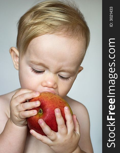 Toddler Eating Apple