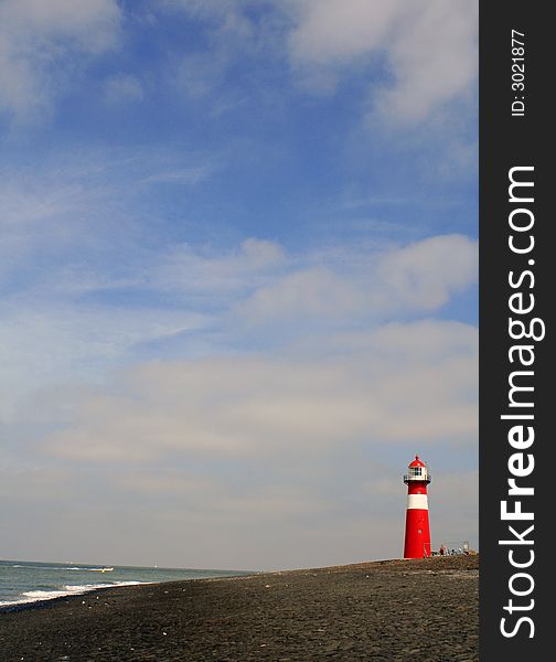 This beacon is photographed on coast of ocean in Holland.
