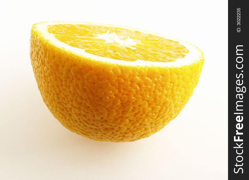 Sliced orange isolated on white with shadow