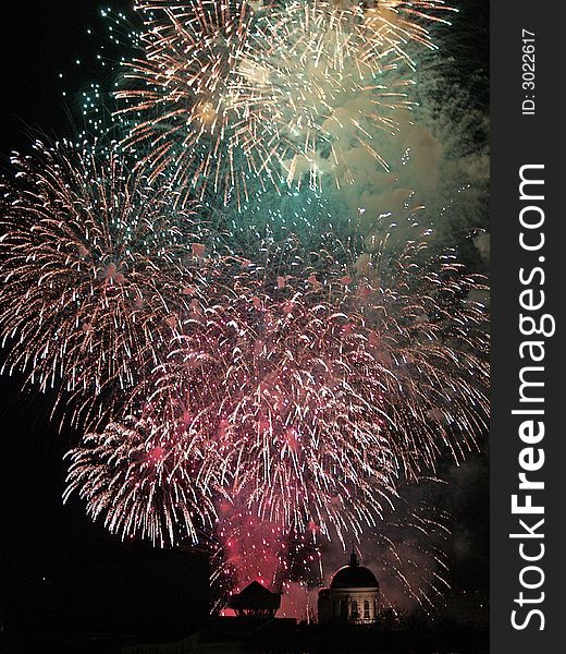 large beautiful coloured firework in night. large beautiful coloured firework in night