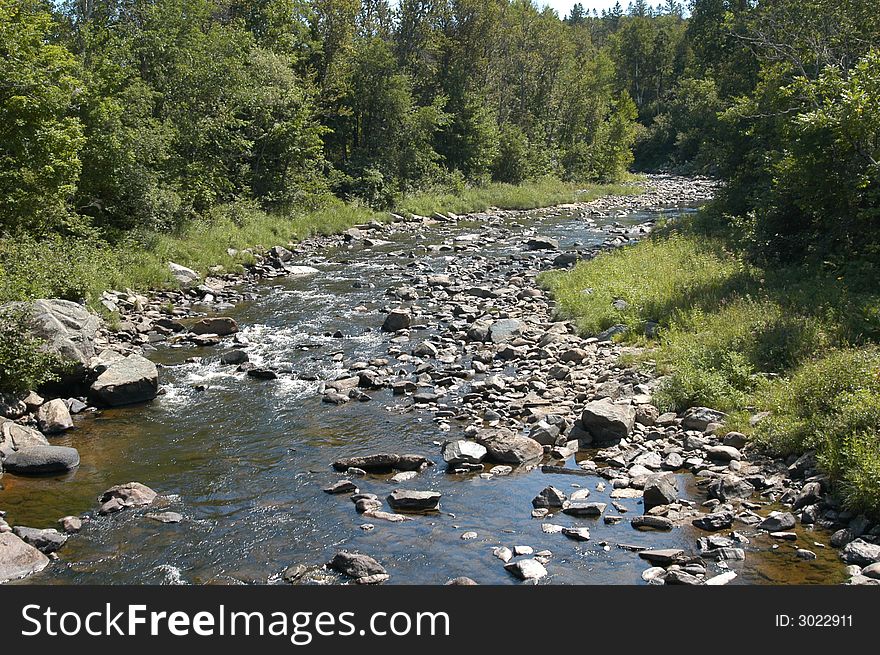 Fast flowing water in rural New Hampshire mountains. Fast flowing water in rural New Hampshire mountains