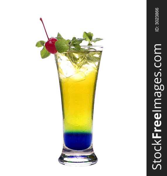 Colorful alcoholic cocktail in a tall glass against white background. Colorful alcoholic cocktail in a tall glass against white background