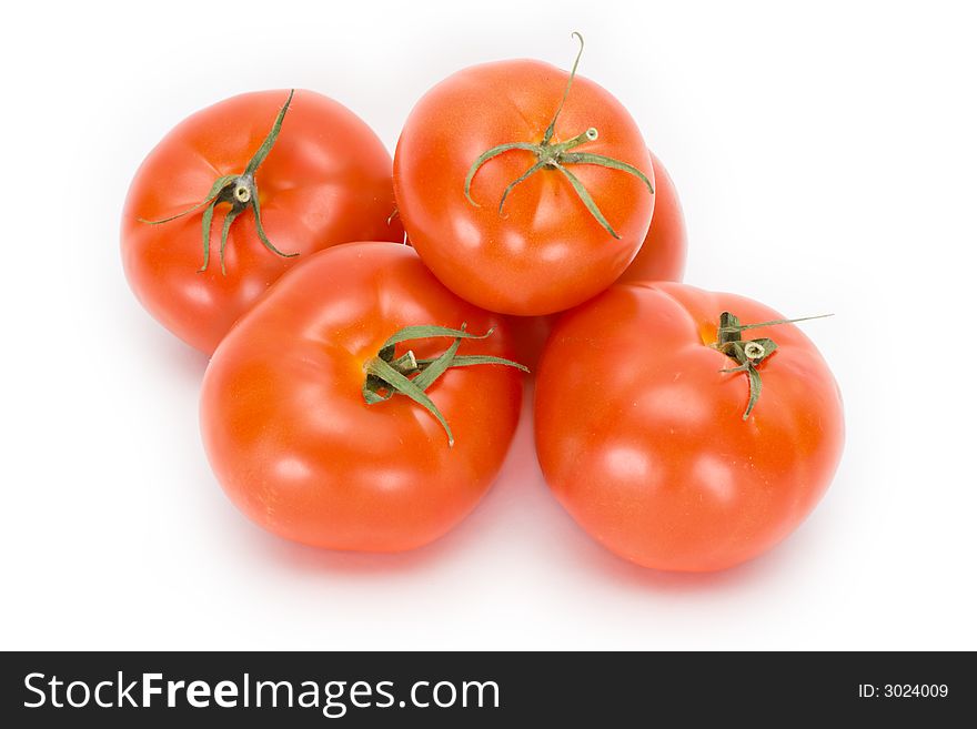 Tomatoes on a white isolated background