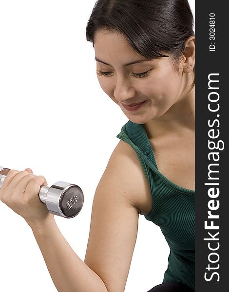 A young woman using weights over a white background. A young woman using weights over a white background