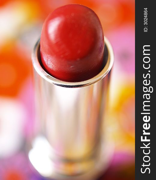 Lipstick on color blur background. Lipstick on color blur background