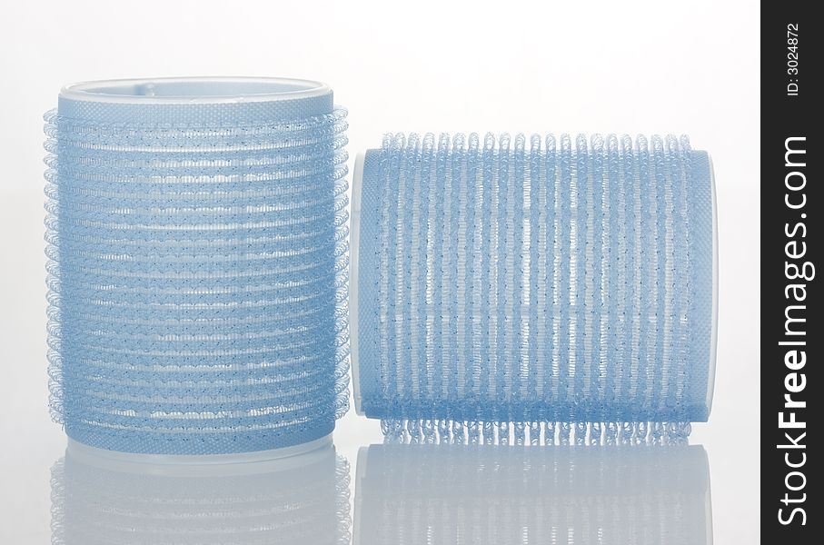 Blue curlers isolated on a white background
