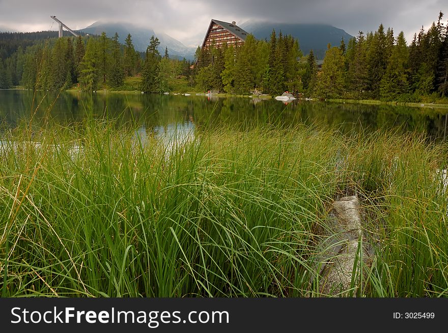 Strbske Pleso is nice lake in High Tatra - Slovakia. Thi photo was created in strong overcast. Strbske Pleso is nice lake in High Tatra - Slovakia. Thi photo was created in strong overcast.