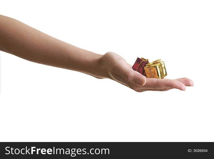 Girl offering two miniature gift boxes over a white background. Girl offering two miniature gift boxes over a white background