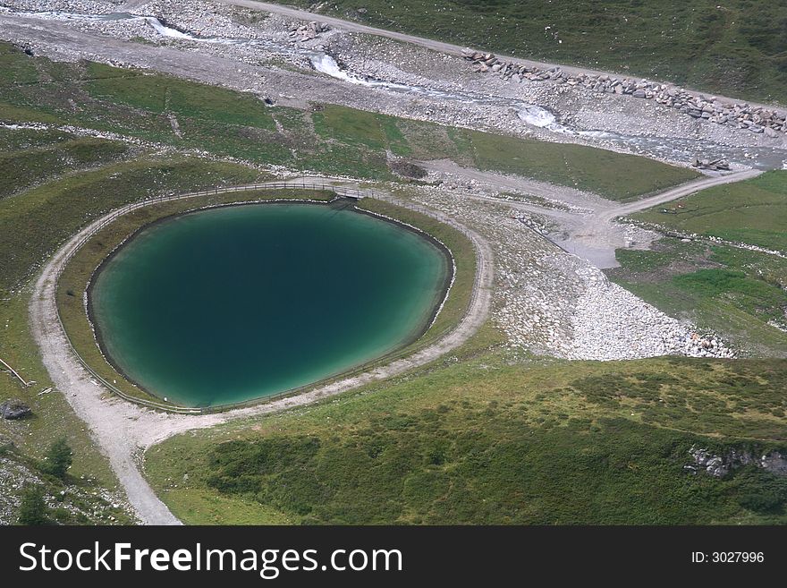 Mountains view with lake from Hintertux glacier in Austrian Tirol. Mountains view with lake from Hintertux glacier in Austrian Tirol