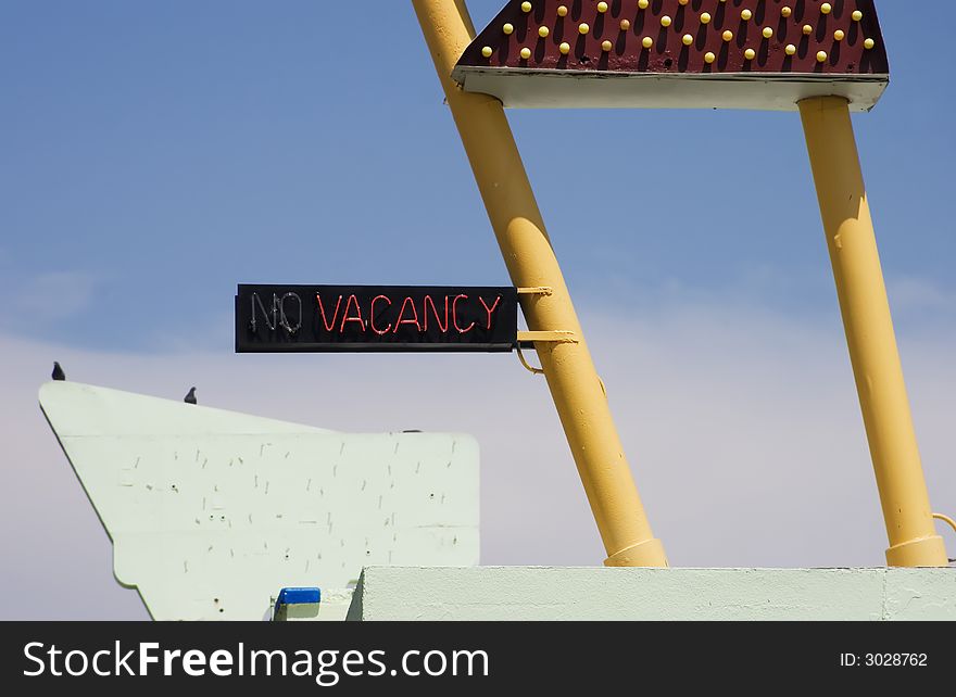 Neon vacancy sign on a funky old roadside motel.