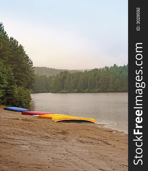 Canoes on the beach at Pog Lake in Algonquin Park.