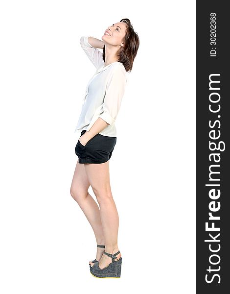 Full length portrait of young happy woman standing on white background