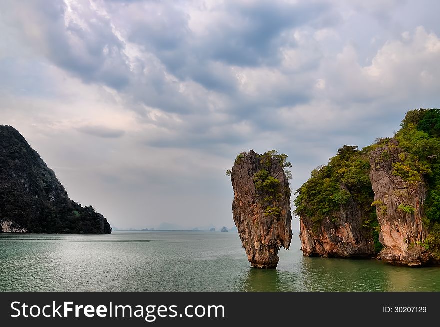 James Bond island ocean view with cloudy sky in Phang Nga bay, A