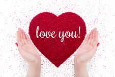 Arms Around A Sandy Red Heart Royalty Free Stock Photo