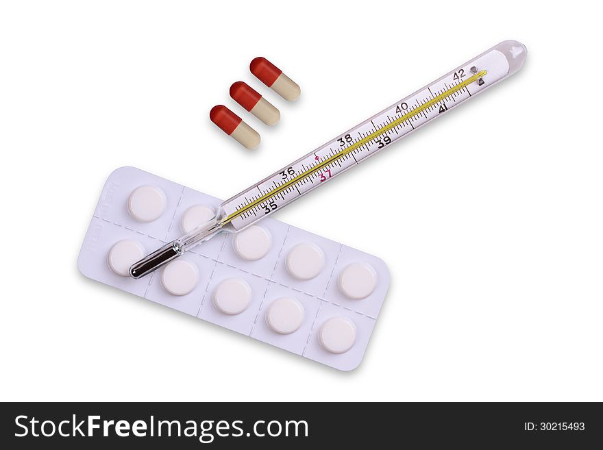 thermometer and pills on white background Medical