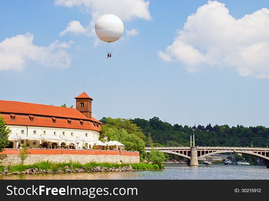 Balloon in the sky over Prague background