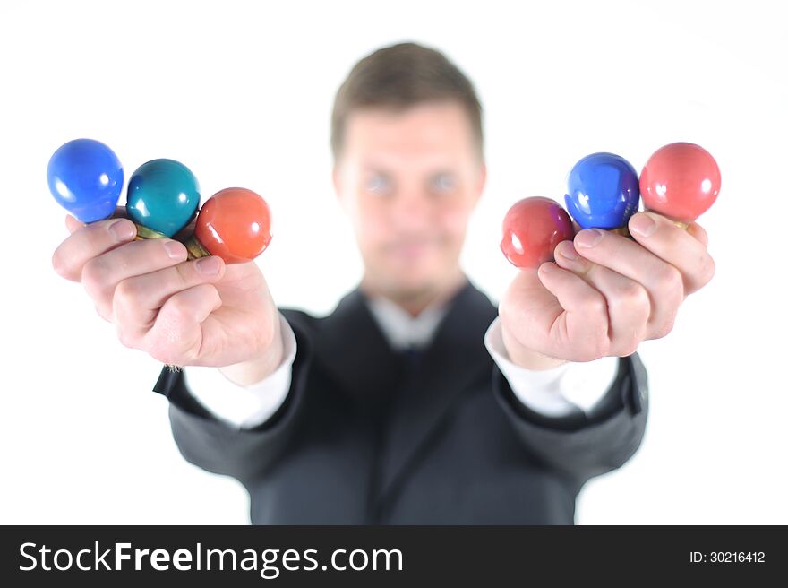 Businessman with light bulbs in his hands. Businessman with light bulbs in his hands.