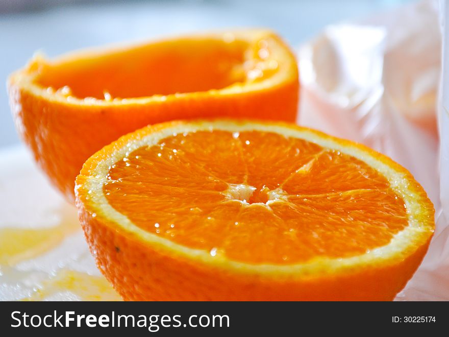 Fresh half orange squeezed for juyce