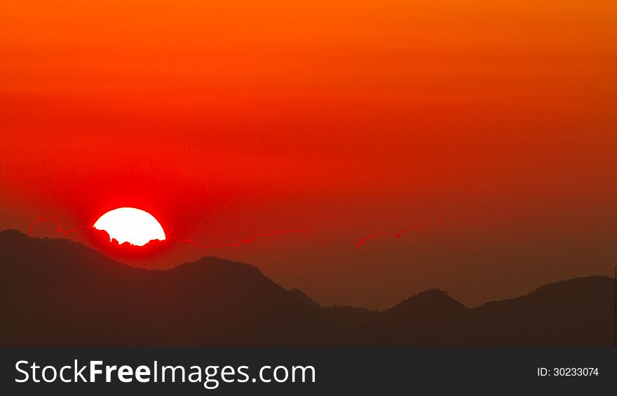 Sunset at mountain and sky background