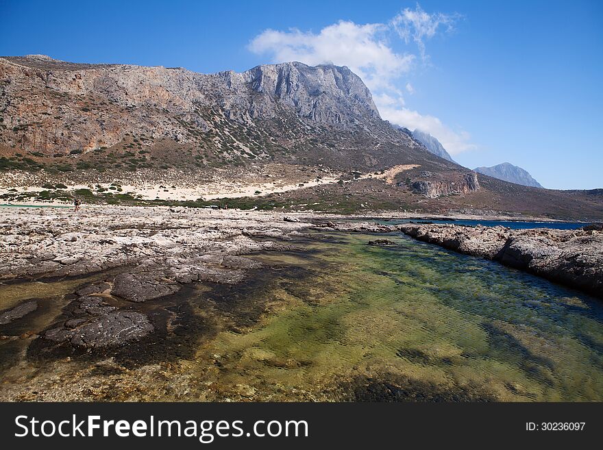 The place is called Bay Beach. Bay this remarkable because it is a place of merge of three seas - the Cretan and Mediterranean, and Ionian. The place is called Bay Beach. Bay this remarkable because it is a place of merge of three seas - the Cretan and Mediterranean, and Ionian.