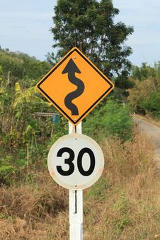 Zig Zag Road Warning Sign And 30km Limit Speed Limit Royalty Free Stock Photos
