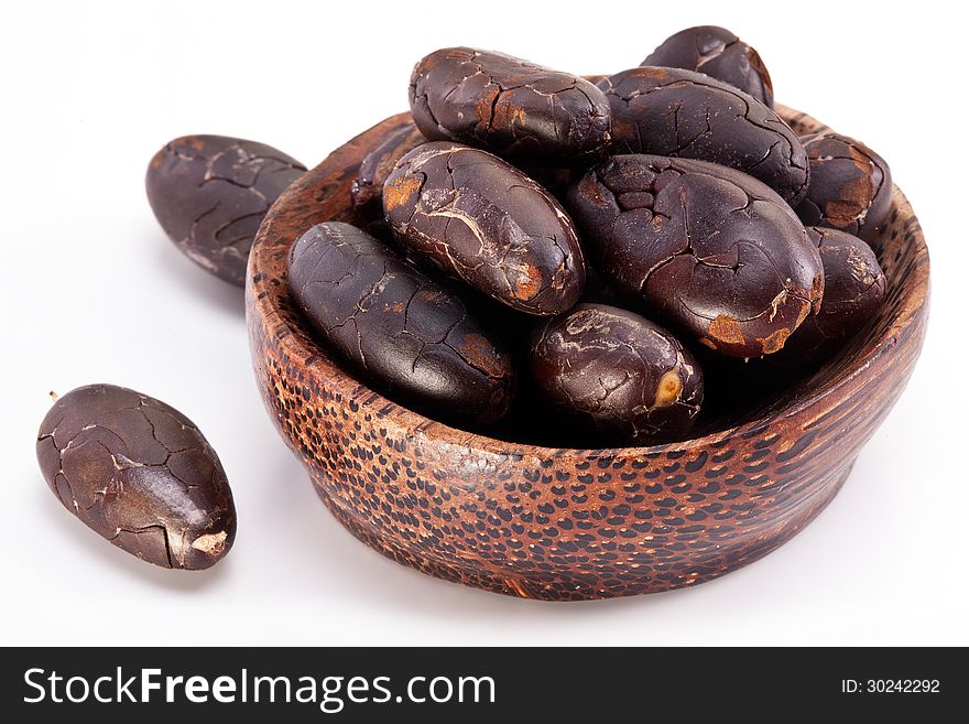 Cocoa beans on a white background.