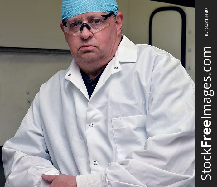 Forensic investigator working on a case in his lab.