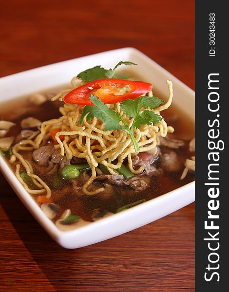 Chinese noodle style. Stew beef with flat noodles. Chinese noodle style. Stew beef with flat noodles.