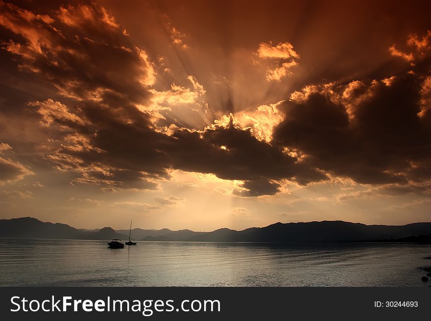 The seaside sunset beautiful rays