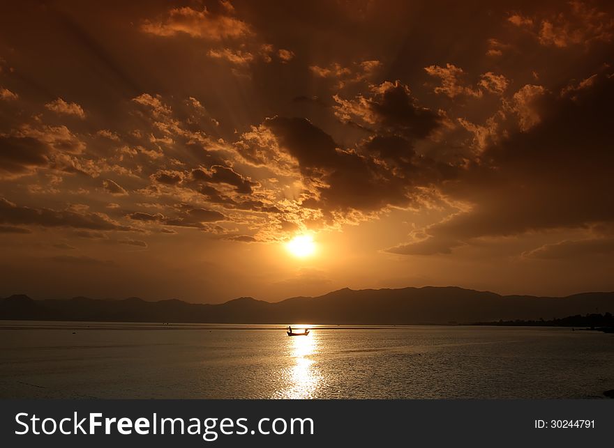 The seaside sunset beautiful rays